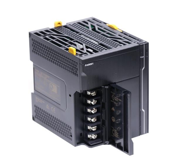 DIN rail mounted power supply installed in an industrial control panel