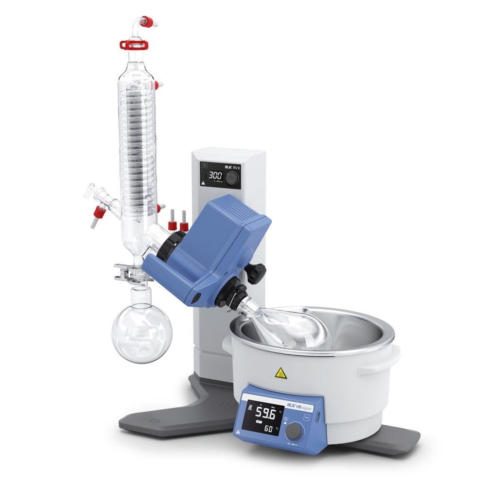 Laboratory rotary evaporator setup with condenser, rotating flask, and heating bath